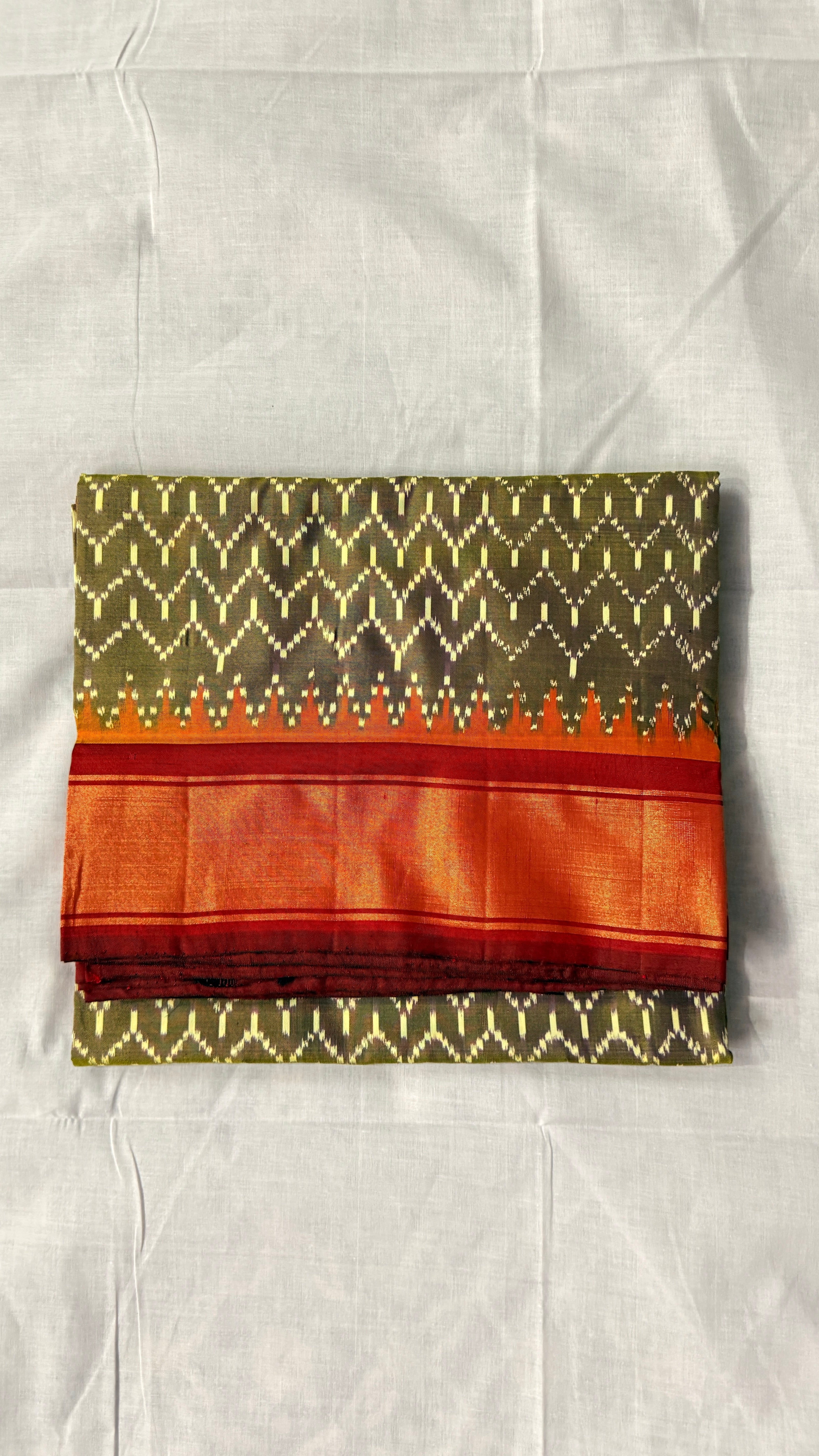 Handwoven Olive Green Ikat Silk Saree with Red–Orange Kaddi Border & Silk Mark Certified ths-18